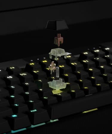 Bildversion für Mobilgeräte eines in seine Einzelteile zerlegten mechanischen CHERRY MX SPEED RGB Red Tastenschalters zeigt den inneren Aufbau des Schalters.