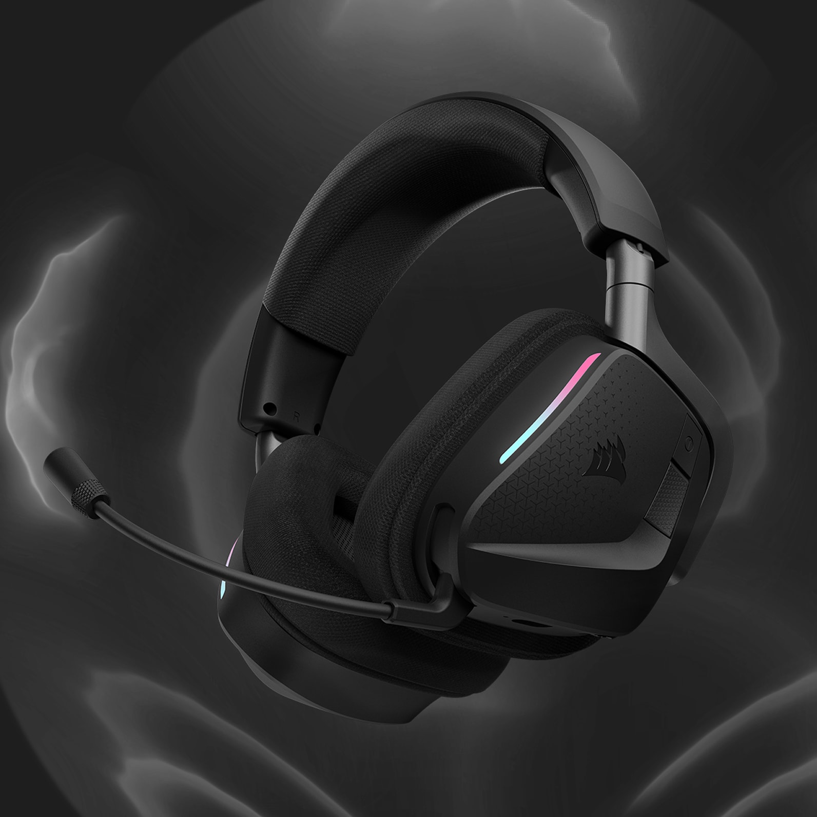 CORSAIR VOID v2 MAX wireless headset with RGB ear cup lighting and boom mic floating on a dark smoky background.