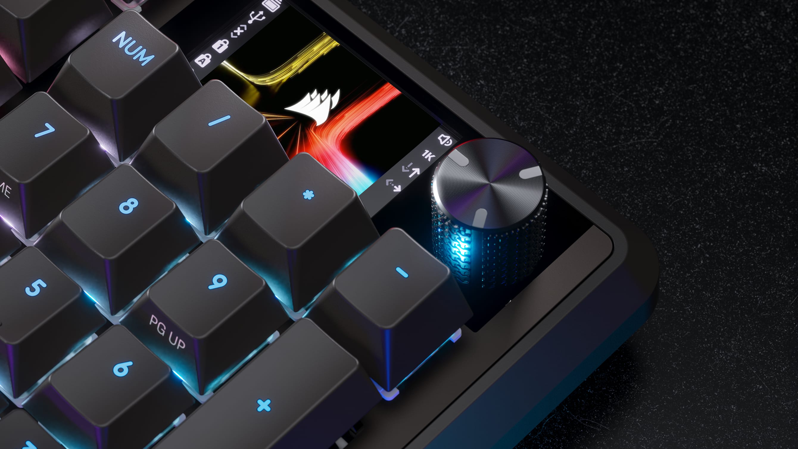 CORSAIR Vanguard 96 multi-functional rotary dial with blue RGB glow and built-in display showing CORSAIR artwork.