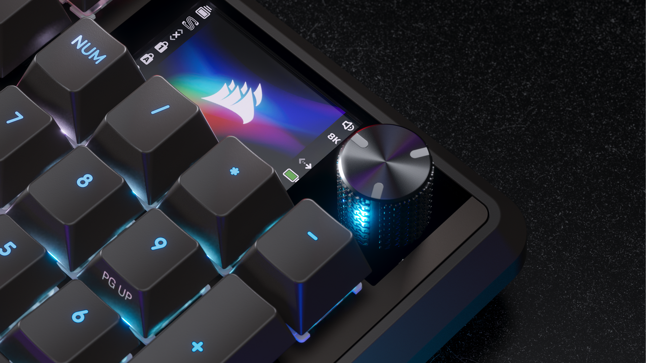 VANGUARD 96 WIRELESSキーボードの多機能ロータリーダイヤルと青いグローおよび内蔵ディスプレイのクローズアップ。