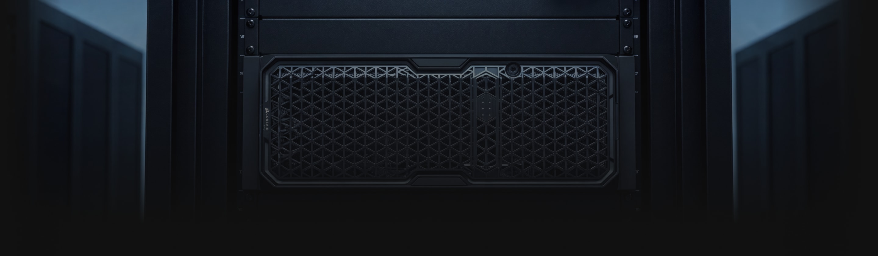 Dramatic close-up of PC server rack interior components shot in low light against a dark background.