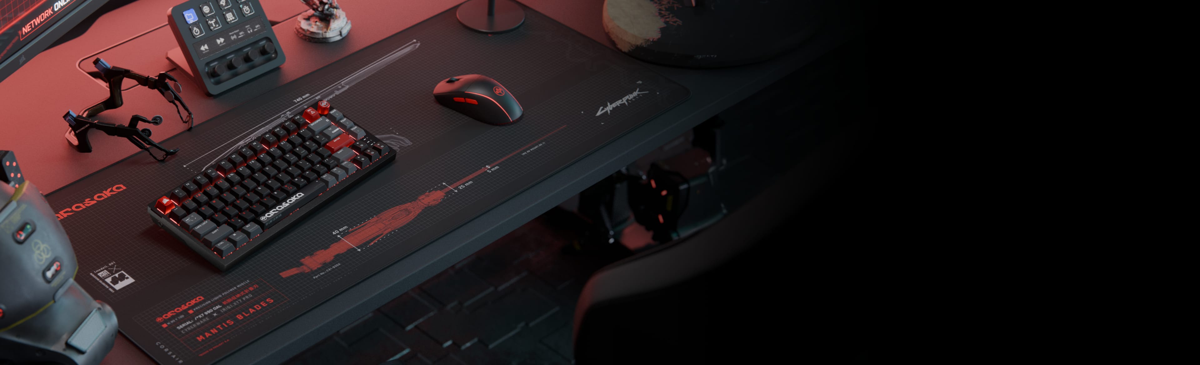 Cyberpunk Arasaka-themed CORSAIR gaming collection: keyboard, mouse, and mousepad displayed on a dark gaming desk.