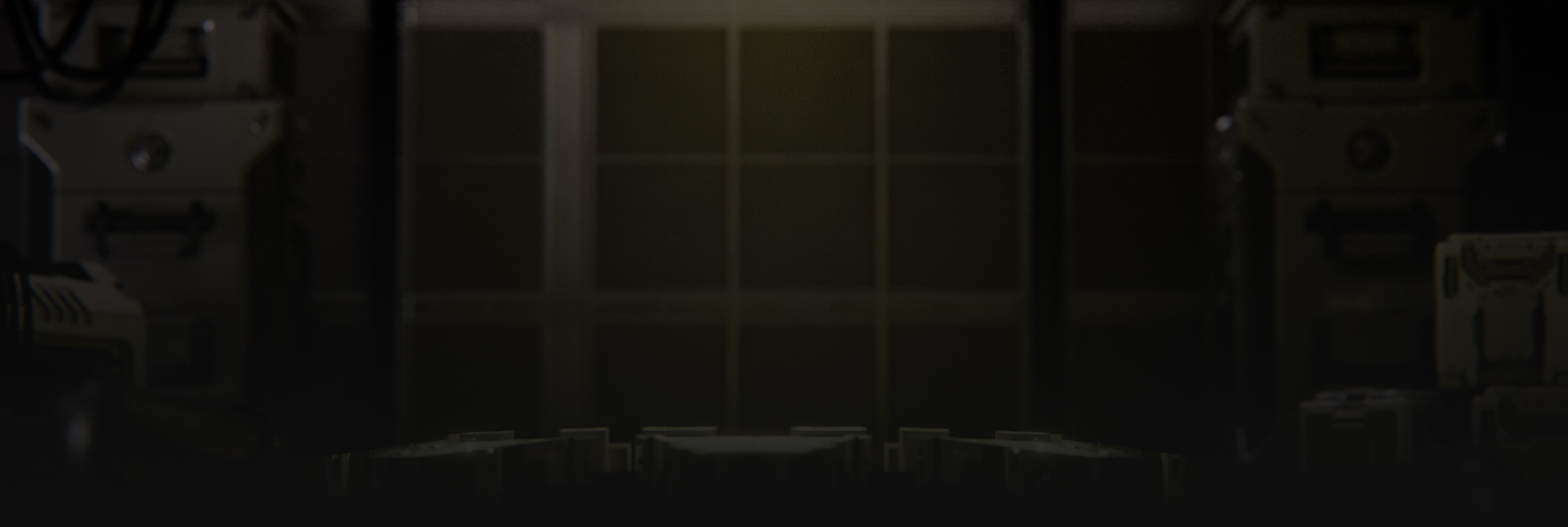 Dramatic close-up of PC server rack interior components shot in low light against a dark background.
