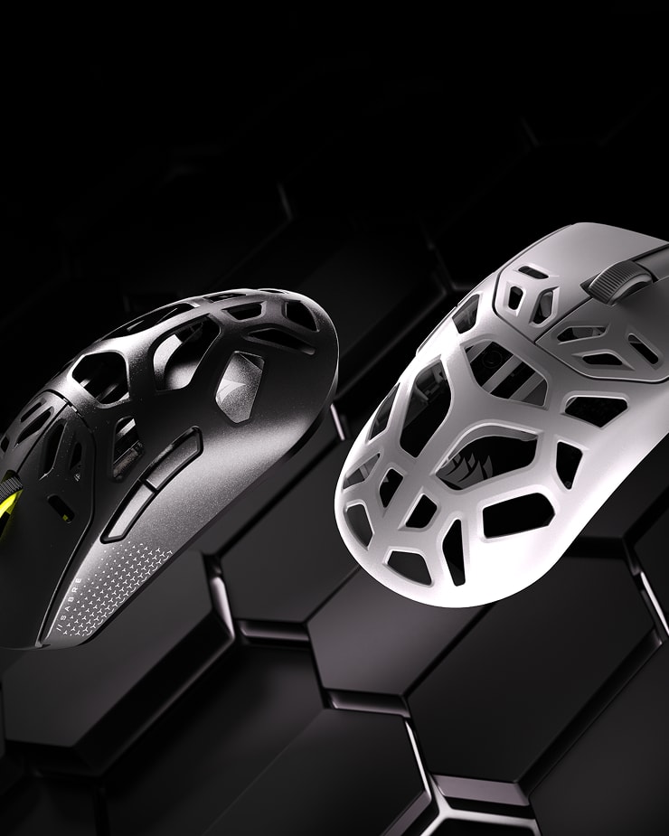 CORSAIR SABRE v2 WL MG gaming mice in black and white colorways showing the open-mesh magnesium ultra-lightweight chassis.