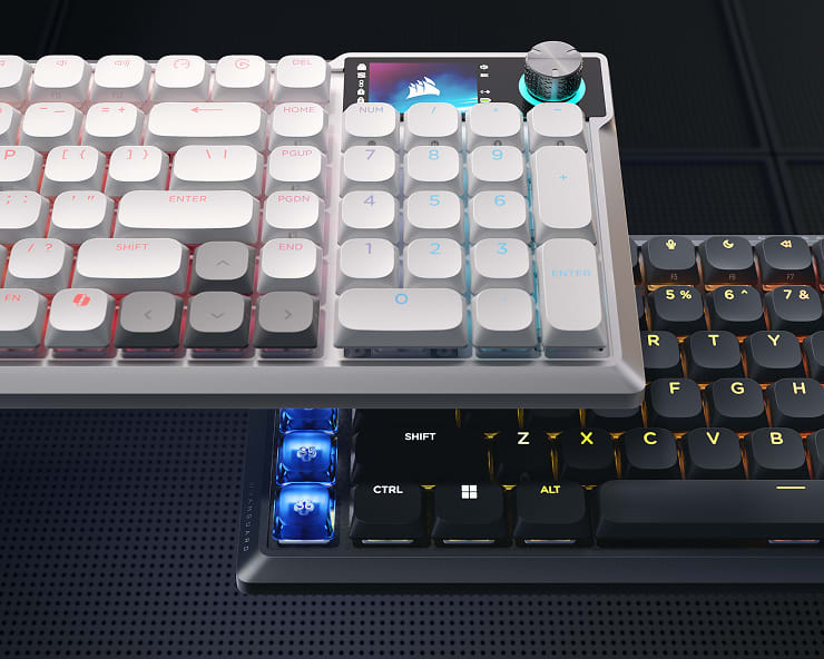 CORSAIR VANGUARD AIR 99 wireless keyboard hero shot showing white and black color variants side by side with LCD screen.