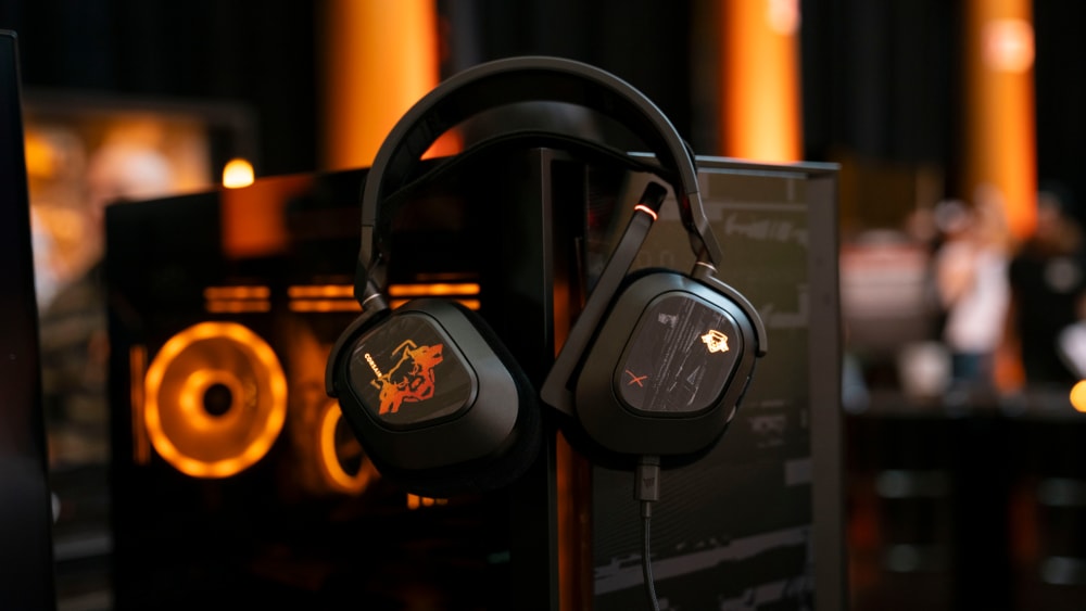 Call of Duty® Black Ops 6 Editions of the HS80 RGB WIRELESS Premium Gaming Headset With Spatial Audio and the VENGEANCE i7500 Gaming PC, from CORSAIR.