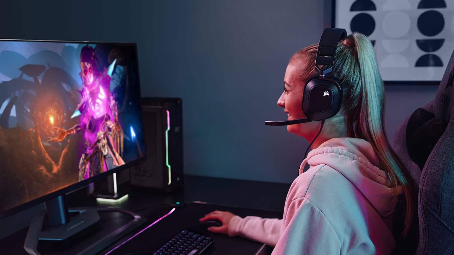 Woman playing PC games while using the HS80 RGB USB Gaming Headset.