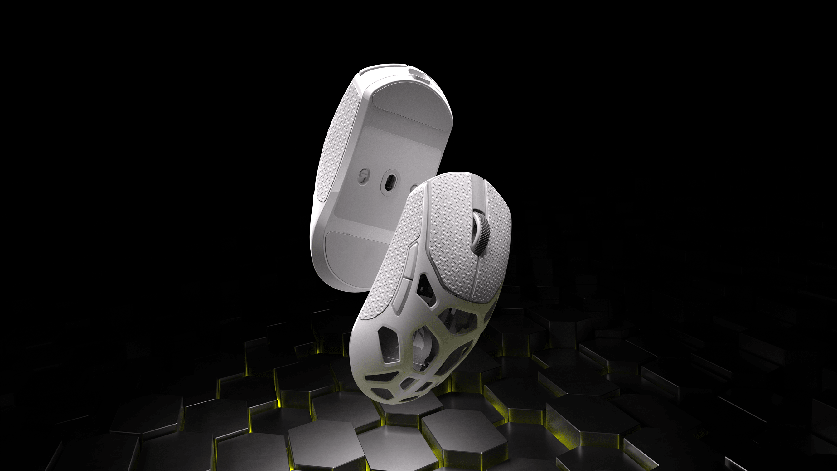 A over and underside shot of the SABRE v2 PRO WIRELESS MG in white with grip tape.