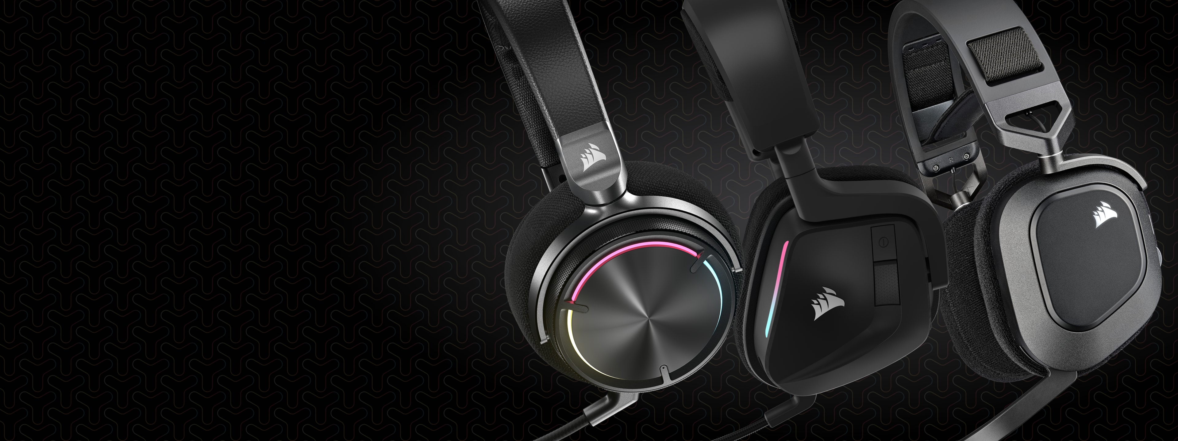 Three Corsair gaming headsets on a dark patterned background, featuring wired and wireless models with RGB lighting.