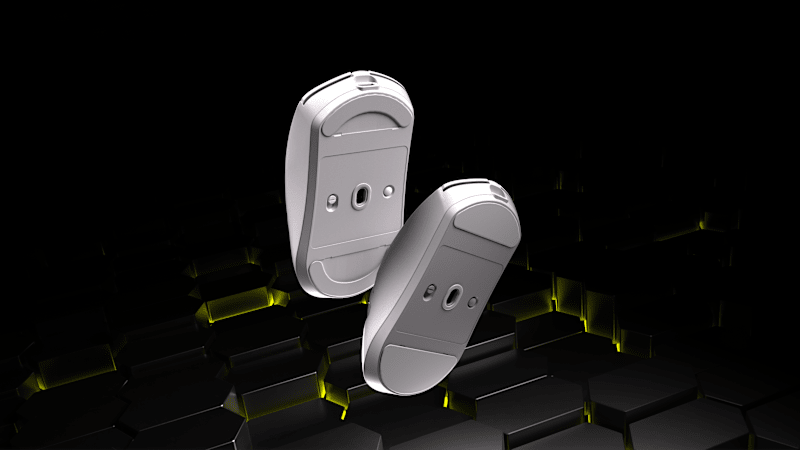 An underside shot of the mouse skates on the SABRE v2 PRO WIRELESS MG in white.