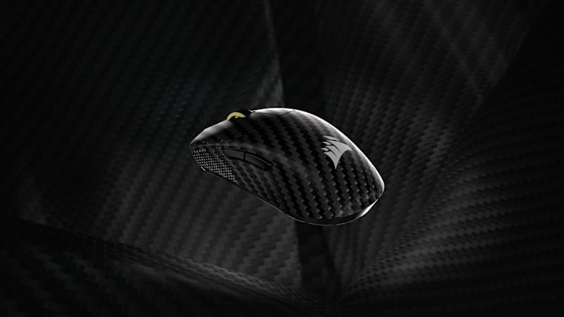 An image showcasing the SABRE v2 PRO WIRELESS Carbon Fiber's ultralight design.
