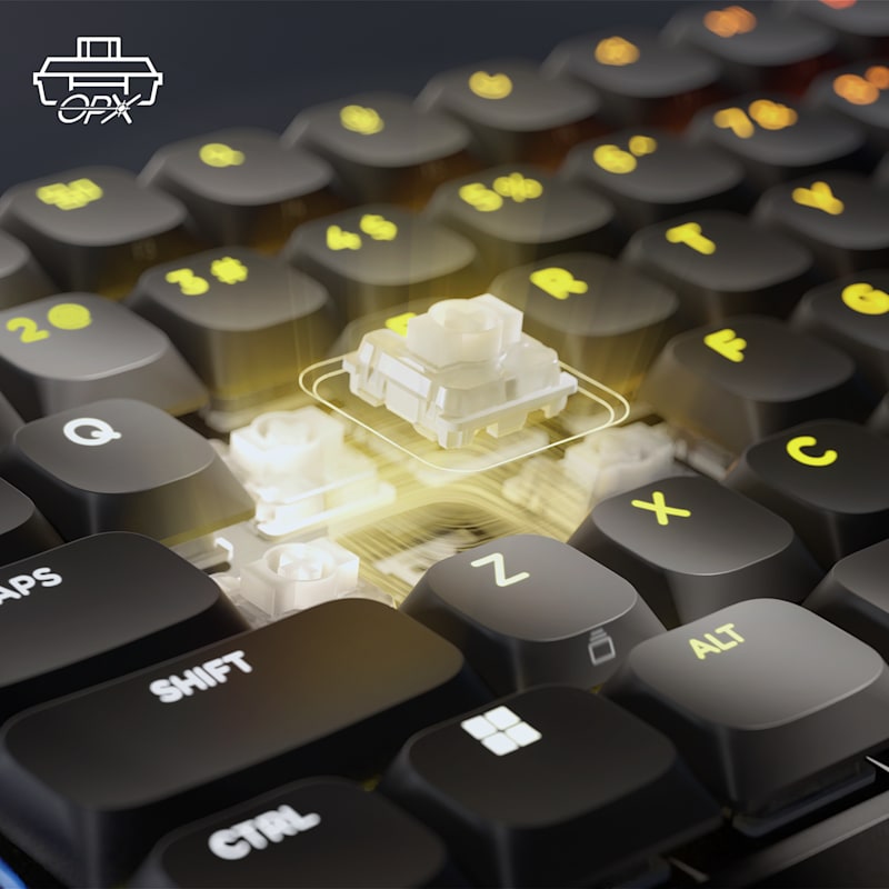 VANGUARD AIR 99 keyboard close-up highlighting the CORSAIR OPX optical-mechanical switch with glowing yellow light effect.