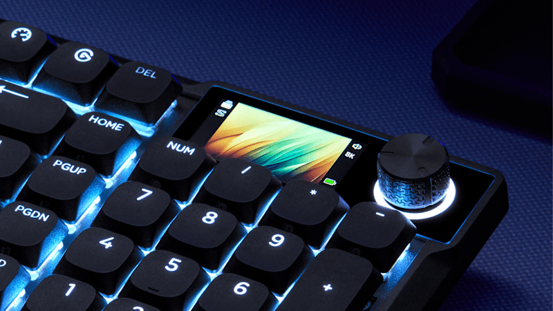 VANGUARD AIR 99 keyboard close-up showing the colorful LCD screen and illuminated rotary knob with blue LED glow.